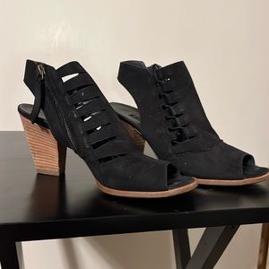Black heal bootie with cutout detail